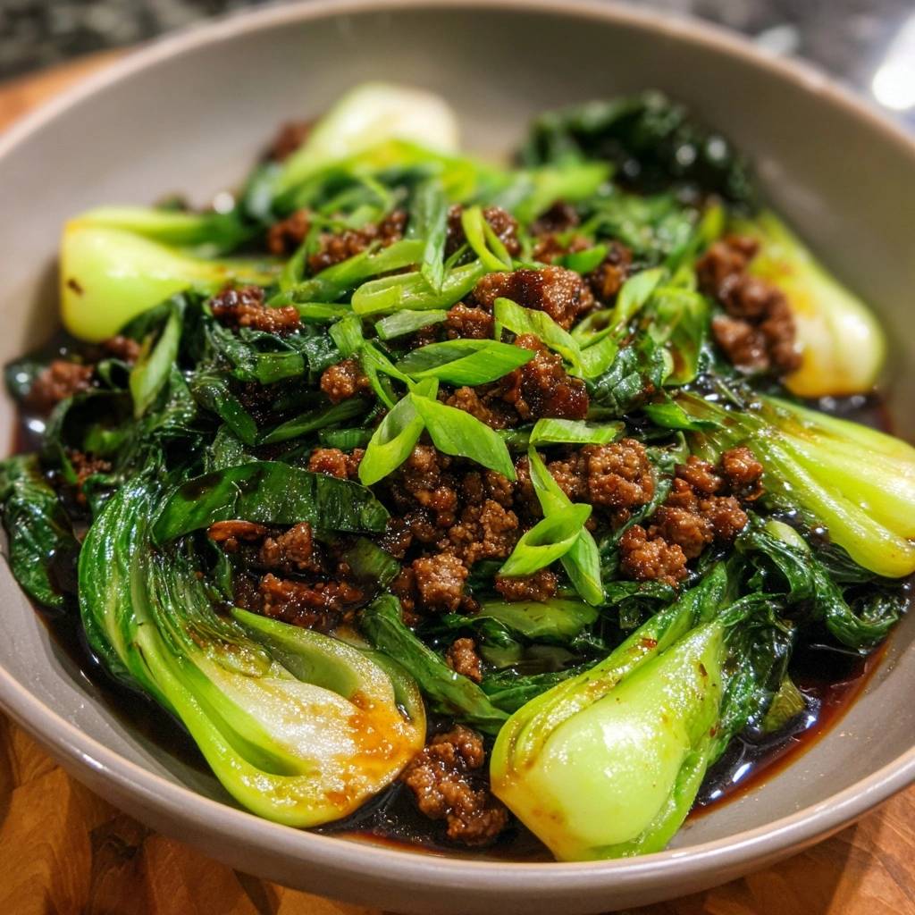 Beef Bok Choy Stir-Fry with a close-up view of the minced beef and green onion topping.